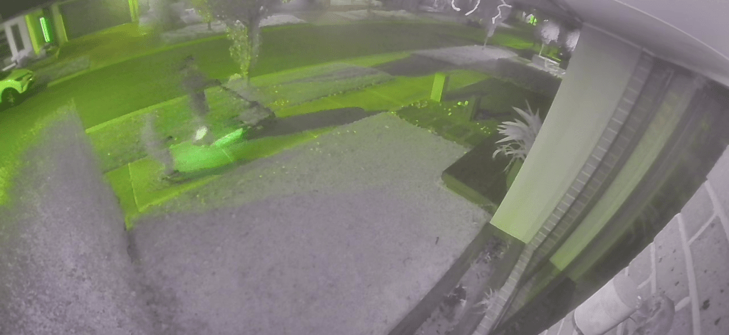 Ring Solar Camera night vision image showing motion detection and driveway coverage at night after one year of use.